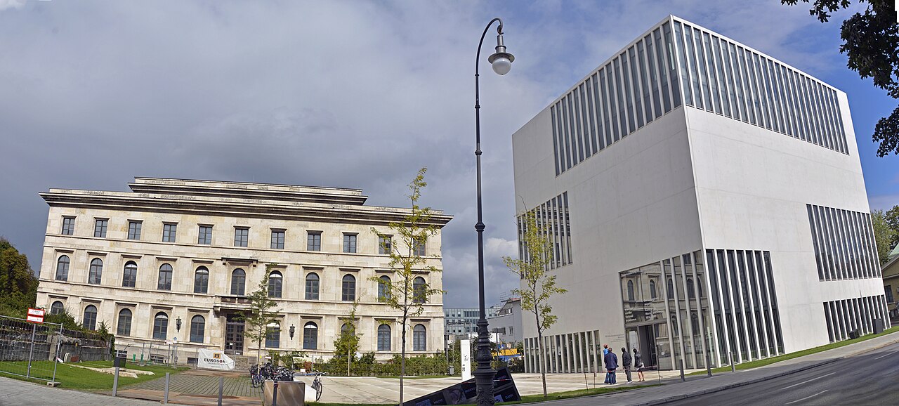 Panorama of Brienner Straße and Arcisstraße: on the left the long pale stone front of the former Führerbau (today the music...