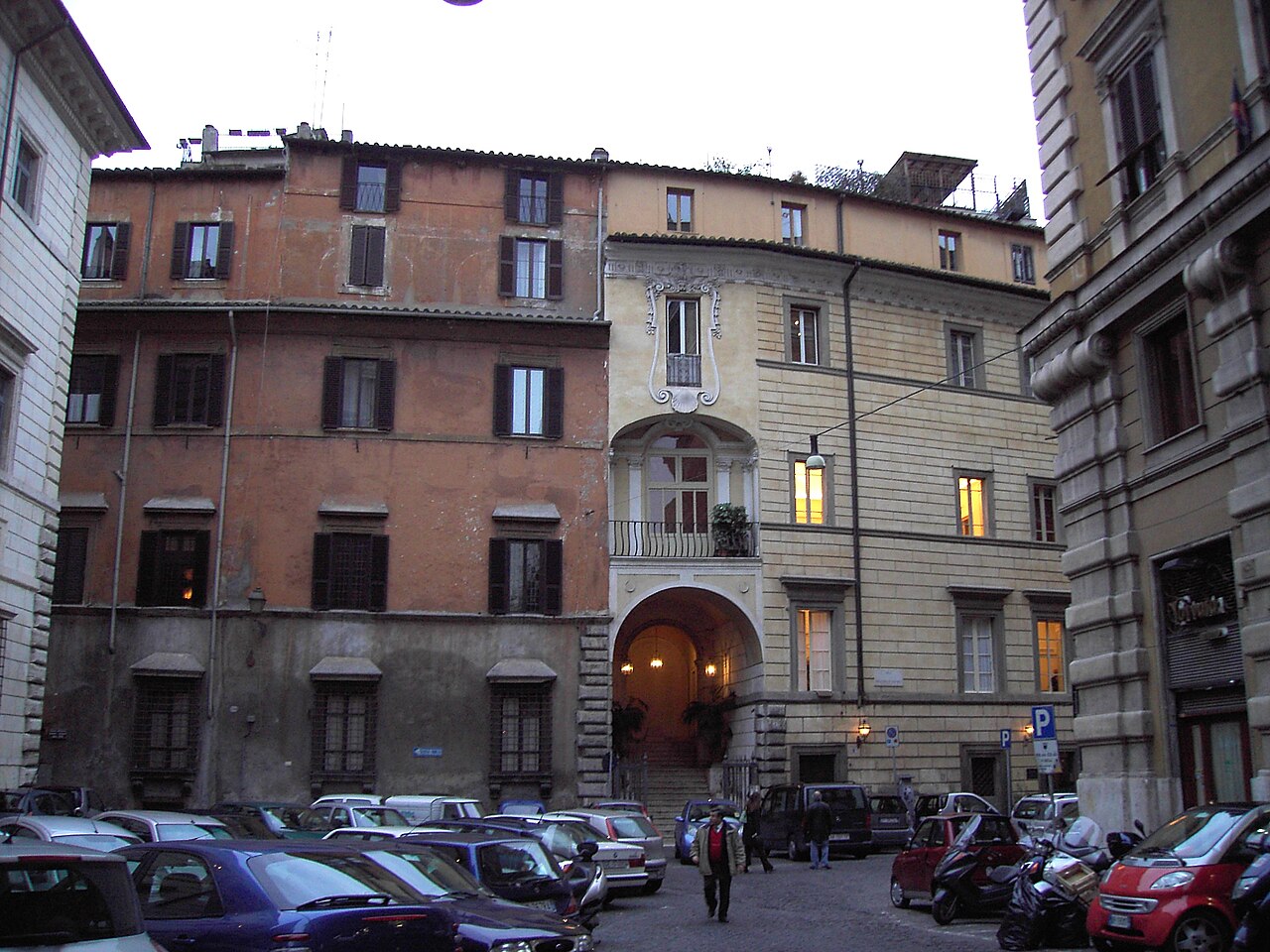 A small cobbled square below tall plain palace fronts.